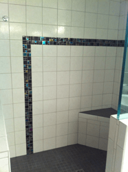 Custom tiled shower by Girard Builders